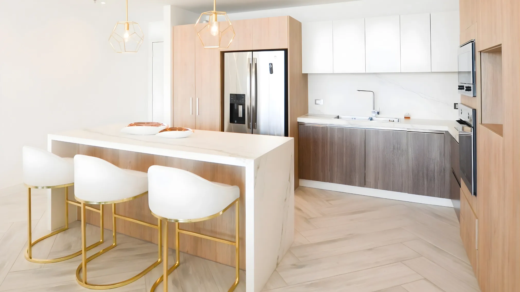 Bespoke bright kitchen with island, open shelving, and sunlit finishes. Bespoke Renovation in Quito, Ecuador.